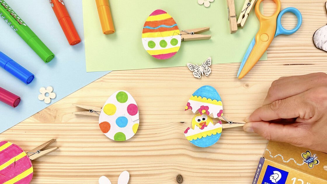 Easter DIY idea for children: Make colourful Easter eggs with clothes pegs