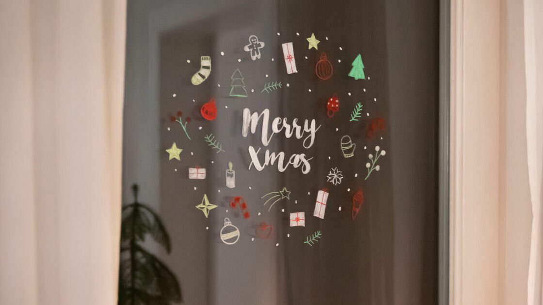 Christmas window design with chalk markers